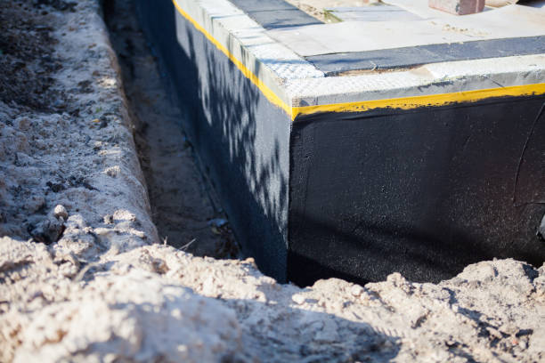 Professional Waterproofing technician working in Hampton, VA